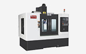 How does the rotary axis of the vertical machining center work?